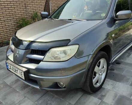 Серый Мицубиси Аутлендер, объемом двигателя 2.4 л и пробегом 23 тыс. км за 8300 $, фото 11 на Automoto.ua