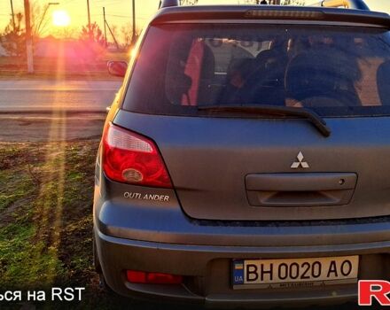 Сірий Міцубісі Аутлендер, об'ємом двигуна 2.4 л та пробігом 211 тис. км за 5000 $, фото 3 на Automoto.ua