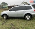 Серый Мицубиси Аутлендер, объемом двигателя 2 л и пробегом 270 тыс. км за 7000 $, фото 4 на Automoto.ua