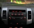 Серый Мицубиси Аутлендер, объемом двигателя 3 л и пробегом 129 тыс. км за 10500 $, фото 16 на Automoto.ua