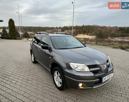 Сірий Міцубісі Аутлендер, об'ємом двигуна 2 л та пробігом 192 тис. км за 6400 $, фото 21 на Automoto.ua
