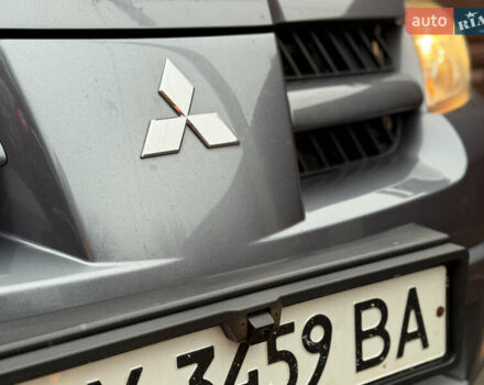 Серый Мицубиси Аутлендер, объемом двигателя 2.4 л и пробегом 240 тыс. км за 6900 $, фото 30 на Automoto.ua