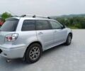 Серый Мицубиси Аутлендер, объемом двигателя 2.4 л и пробегом 243 тыс. км за 6200 $, фото 4 на Automoto.ua