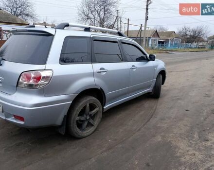 Сірий Міцубісі Аутлендер, об'ємом двигуна 2 л та пробігом 350 тис. км за 5350 $, фото 8 на Automoto.ua