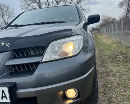 Сірий Міцубісі Аутлендер, об'ємом двигуна 2 л та пробігом 280 тис. км за 7200 $, фото 1 на Automoto.ua