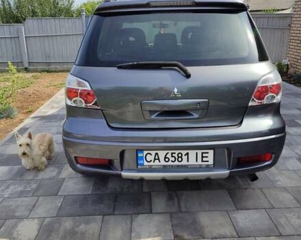 Серый Мицубиси Аутлендер, объемом двигателя 2.4 л и пробегом 23 тыс. км за 8300 $, фото 21 на Automoto.ua
