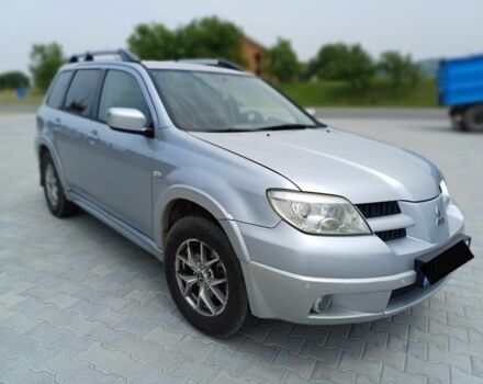 Серый Мицубиси Аутлендер, объемом двигателя 2.4 л и пробегом 243 тыс. км за 6200 $, фото 3 на Automoto.ua