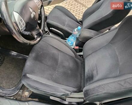 Серый Мицубиси Аутлендер, объемом двигателя 2 л и пробегом 332 тыс. км за 7650 $, фото 20 на Automoto.ua