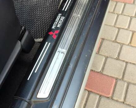 Серый Мицубиси Аутлендер, объемом двигателя 2.38 л и пробегом 189 тыс. км за 7600 $, фото 10 на Automoto.ua