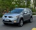 Серый Мицубиси Аутлендер, объемом двигателя 2.36 л и пробегом 335 тыс. км за 9000 $, фото 1 на Automoto.ua