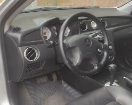 Сірий Міцубісі Аутлендер, об'ємом двигуна 2.38 л та пробігом 200 тис. км за 6550 $, фото 6 на Automoto.ua