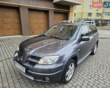 Сірий Міцубісі Аутлендер, об'ємом двигуна 2.38 л та пробігом 267 тис. км за 6300 $, фото 17 на Automoto.ua