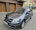 Сірий Міцубісі Аутлендер, об'ємом двигуна 2.38 л та пробігом 267 тис. км за 6300 $, фото 17 на Automoto.ua