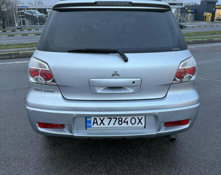 Сірий Міцубісі Аутлендер, об'ємом двигуна 2.4 л та пробігом 190 тис. км за 7500 $, фото 4 на Automoto.ua