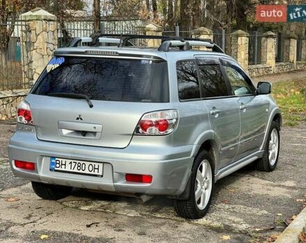 Серый Мицубиси Аутлендер, объемом двигателя 2.38 л и пробегом 170 тыс. км за 6900 $, фото 9 на Automoto.ua