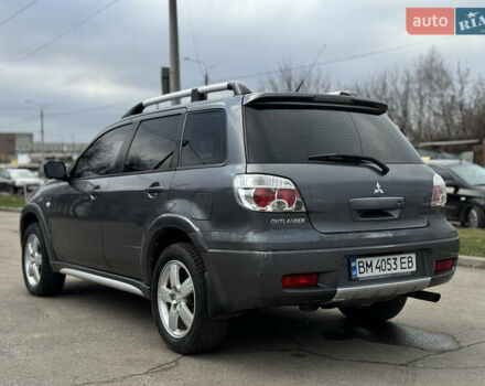 Серый Мицубиси Аутлендер, объемом двигателя 2.38 л и пробегом 254 тыс. км за 7300 $, фото 10 на Automoto.ua