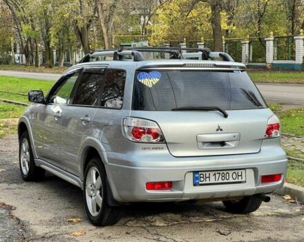Серый Мицубиси Аутлендер, объемом двигателя 2.4 л и пробегом 170 тыс. км за 6900 $, фото 5 на Automoto.ua