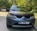 Серый Мицубиси Аутлендер, объемом двигателя 2 л и пробегом 225 тыс. км за 8300 $, фото 22 на Automoto.ua