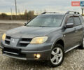 Серый Мицубиси Аутлендер, объемом двигателя 2 л и пробегом 199 тыс. км за 5999 $, фото 4 на Automoto.ua