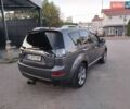 Сірий Міцубісі Аутлендер, об'ємом двигуна 2.4 л та пробігом 219 тис. км за 8000 $, фото 8 на Automoto.ua
