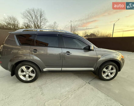 Серый Мицубиси Аутлендер, объемом двигателя 2.4 л и пробегом 210 тыс. км за 8300 $, фото 7 на Automoto.ua
