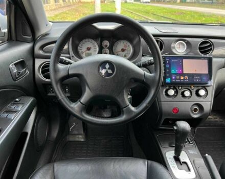 Серый Мицубиси Аутлендер, объемом двигателя 2.4 л и пробегом 170 тыс. км за 6900 $, фото 14 на Automoto.ua