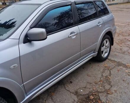 Серый Мицубиси Аутлендер, объемом двигателя 2.38 л и пробегом 113 тыс. км за 8900 $, фото 11 на Automoto.ua