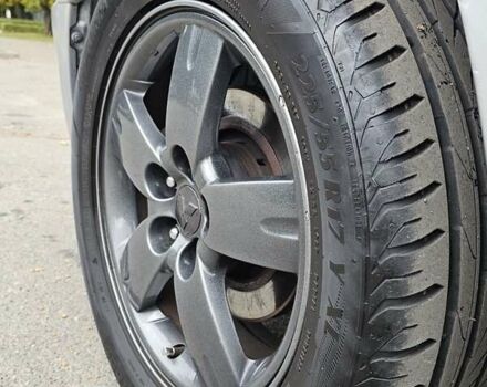 Серый Мицубиси Аутлендер, объемом двигателя 2.38 л и пробегом 200 тыс. км за 5600 $, фото 13 на Automoto.ua