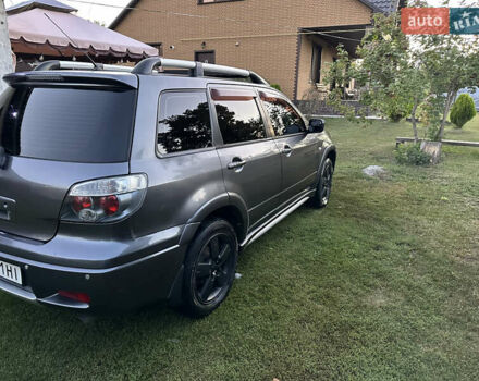 Сірий Міцубісі Аутлендер, об'ємом двигуна 2.38 л та пробігом 273 тис. км за 8000 $, фото 3 на Automoto.ua