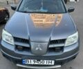 Серый Мицубиси Аутлендер, объемом двигателя 2 л и пробегом 218 тыс. км за 6100 $, фото 7 на Automoto.ua