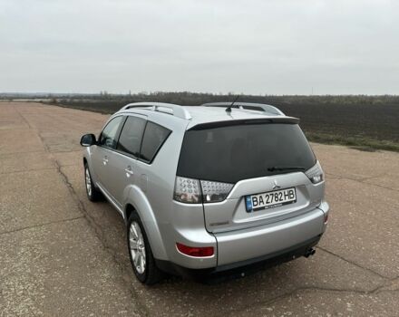 Серый Мицубиси Аутлендер, объемом двигателя 2 л и пробегом 200 тыс. км за 8300 $, фото 5 на Automoto.ua
