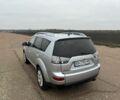 Серый Мицубиси Аутлендер, объемом двигателя 2 л и пробегом 200 тыс. км за 8300 $, фото 5 на Automoto.ua