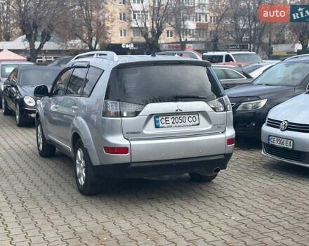 Серый Мицубиси Аутлендер, объемом двигателя 2.36 л и пробегом 237 тыс. км за 8900 $, фото 1 на Automoto.ua