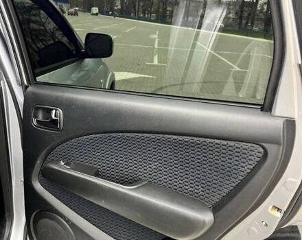 Серый Мицубиси Аутлендер, объемом двигателя 2 л и пробегом 209 тыс. км за 7200 $, фото 11 на Automoto.ua