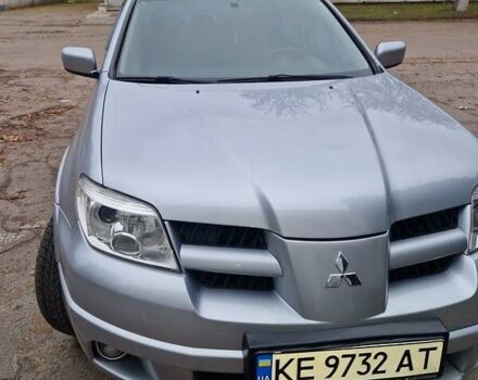 Серый Мицубиси Аутлендер, объемом двигателя 2.38 л и пробегом 113 тыс. км за 8900 $, фото 9 на Automoto.ua