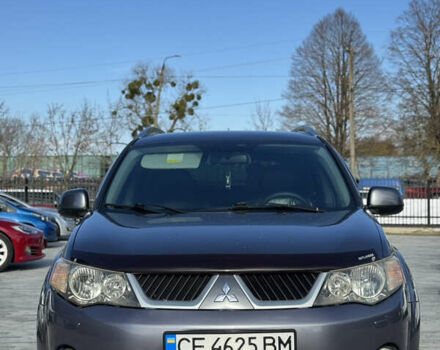 Серый Мицубиси Аутлендер, объемом двигателя 2.36 л и пробегом 215 тыс. км за 8000 $, фото 1 на Automoto.ua
