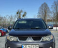 Серый Мицубиси Аутлендер, объемом двигателя 2.36 л и пробегом 215 тыс. км за 8000 $, фото 1 на Automoto.ua