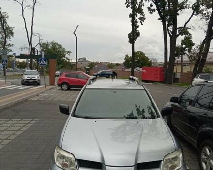 Серый Мицубиси Аутлендер, объемом двигателя 2 л и пробегом 458 тыс. км за 7350 $, фото 2 на Automoto.ua