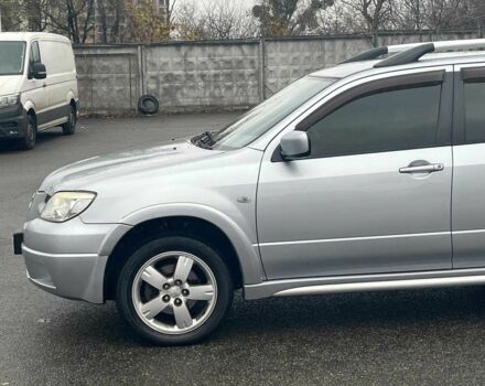 Сірий Міцубісі Аутлендер, об'ємом двигуна 2.4 л та пробігом 324 тис. км за 6890 $, фото 5 на Automoto.ua