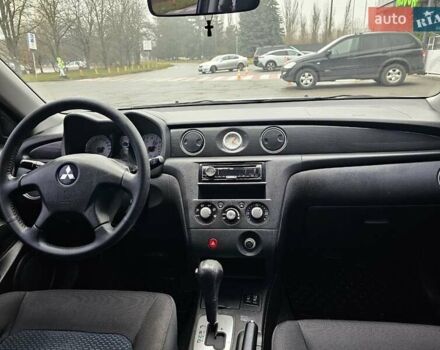 Сірий Міцубісі Аутлендер, об'ємом двигуна 2.38 л та пробігом 230 тис. км за 5400 $, фото 25 на Automoto.ua