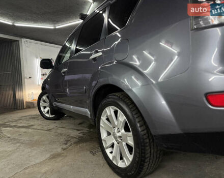 Сірий Міцубісі Аутлендер, об'ємом двигуна 2 л та пробігом 235 тис. км за 8950 $, фото 18 на Automoto.ua