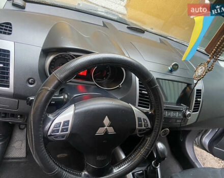 Серый Мицубиси Аутлендер, объемом двигателя 1.97 л и пробегом 229 тыс. км за 8500 $, фото 10 на Automoto.ua