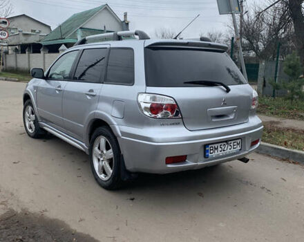 Серый Мицубиси Аутлендер, объемом двигателя 2 л и пробегом 247 тыс. км за 5999 $, фото 7 на Automoto.ua
