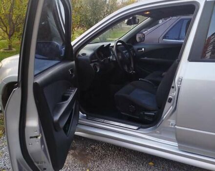 Сірий Міцубісі Аутлендер, об'ємом двигуна 2.38 л та пробігом 209 тис. км за 7460 $, фото 7 на Automoto.ua