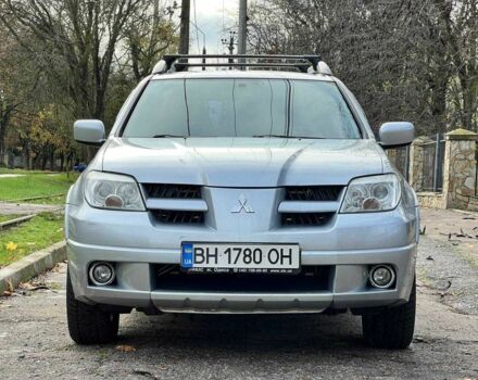 Серый Мицубиси Аутлендер, объемом двигателя 2.4 л и пробегом 170 тыс. км за 6900 $, фото 2 на Automoto.ua