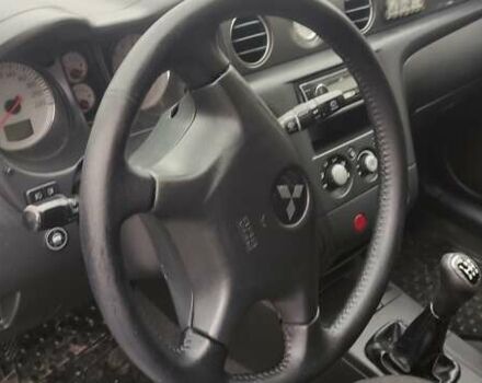 Серый Мицубиси Аутлендер, объемом двигателя 2 л и пробегом 200 тыс. км за 5999 $, фото 12 на Automoto.ua