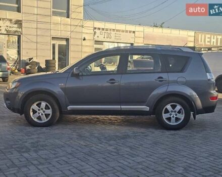 Серый Мицубиси Аутлендер, объемом двигателя 2.4 л и пробегом 235 тыс. км за 8900 $, фото 2 на Automoto.ua