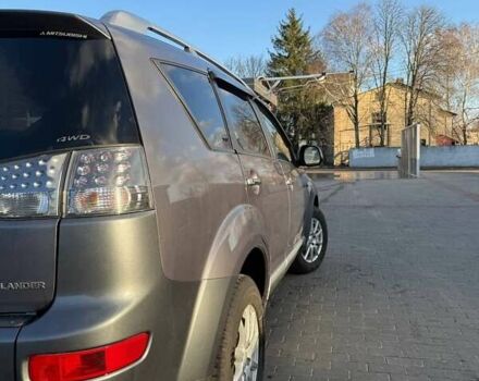 Серый Мицубиси Аутлендер, объемом двигателя 2.18 л и пробегом 287 тыс. км за 10200 $, фото 4 на Automoto.ua