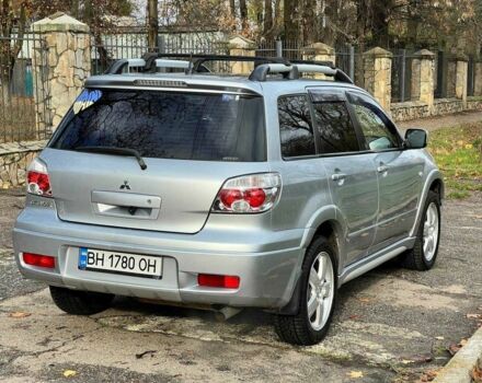 Серый Мицубиси Аутлендер, объемом двигателя 2.4 л и пробегом 170 тыс. км за 6900 $, фото 9 на Automoto.ua