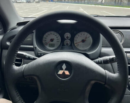 Серый Мицубиси Аутлендер, объемом двигателя 2 л и пробегом 209 тыс. км за 7200 $, фото 15 на Automoto.ua